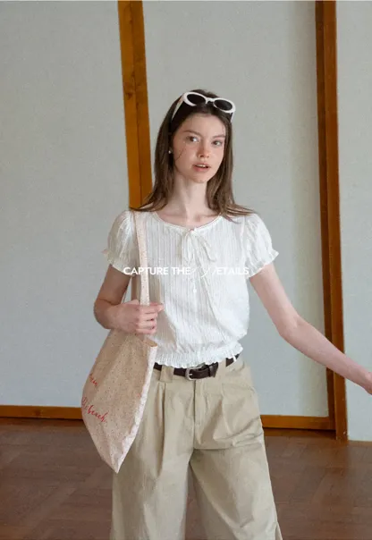 Pleated Short Sleeve Blouse with Ruffled Neckline