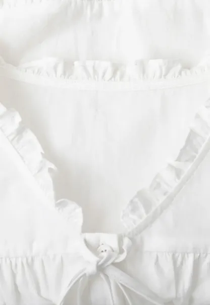 Ruffled Collar Smocked Bodice Peplum Shirt