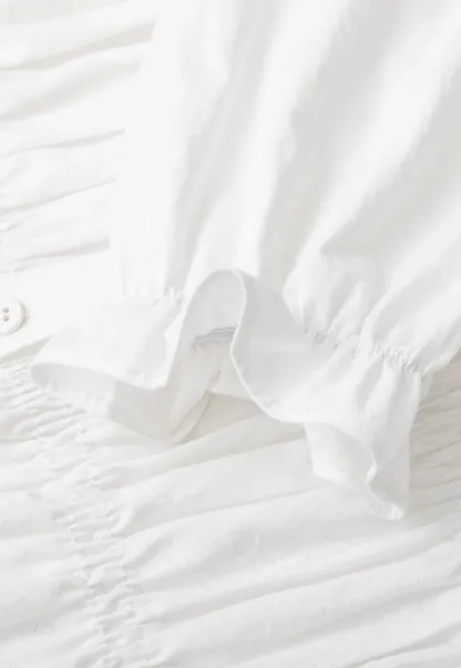 Ruffled Collar Smocked Bodice Peplum Shirt