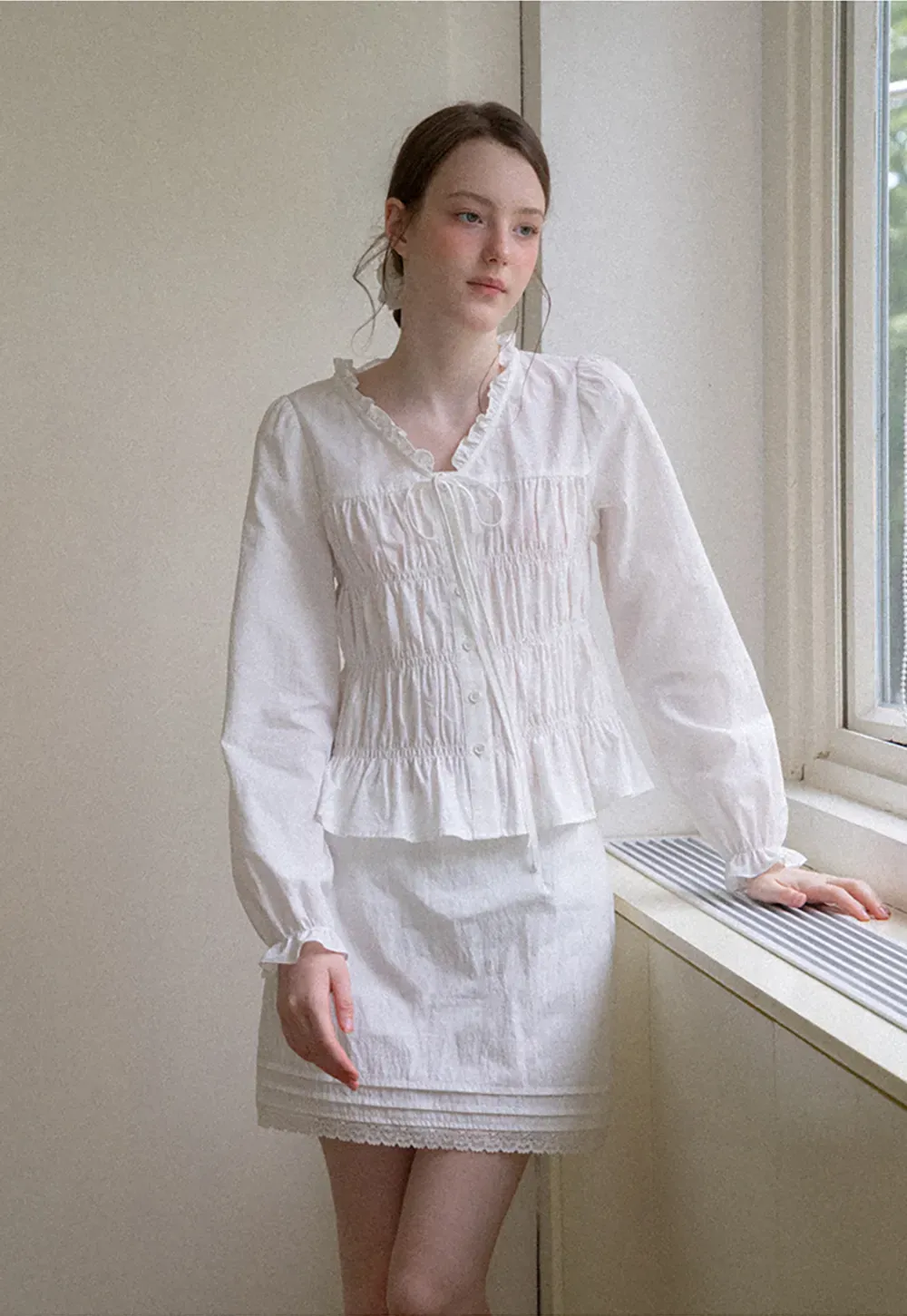 Ruffled Collar Smocked Bodice Peplum Shirt