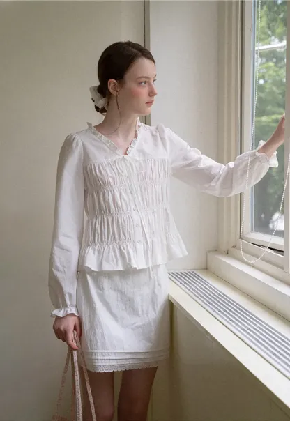 Ruffled Collar Smocked Bodice Peplum Shirt