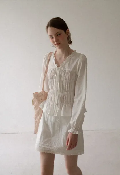 Ruffled Collar Smocked Bodice Peplum Shirt