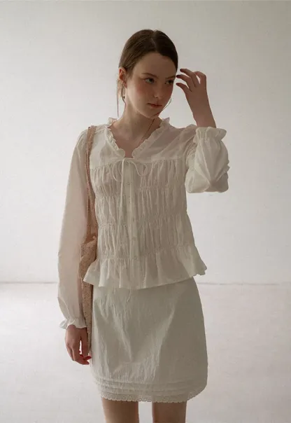 Ruffled Collar Smocked Bodice Peplum Shirt