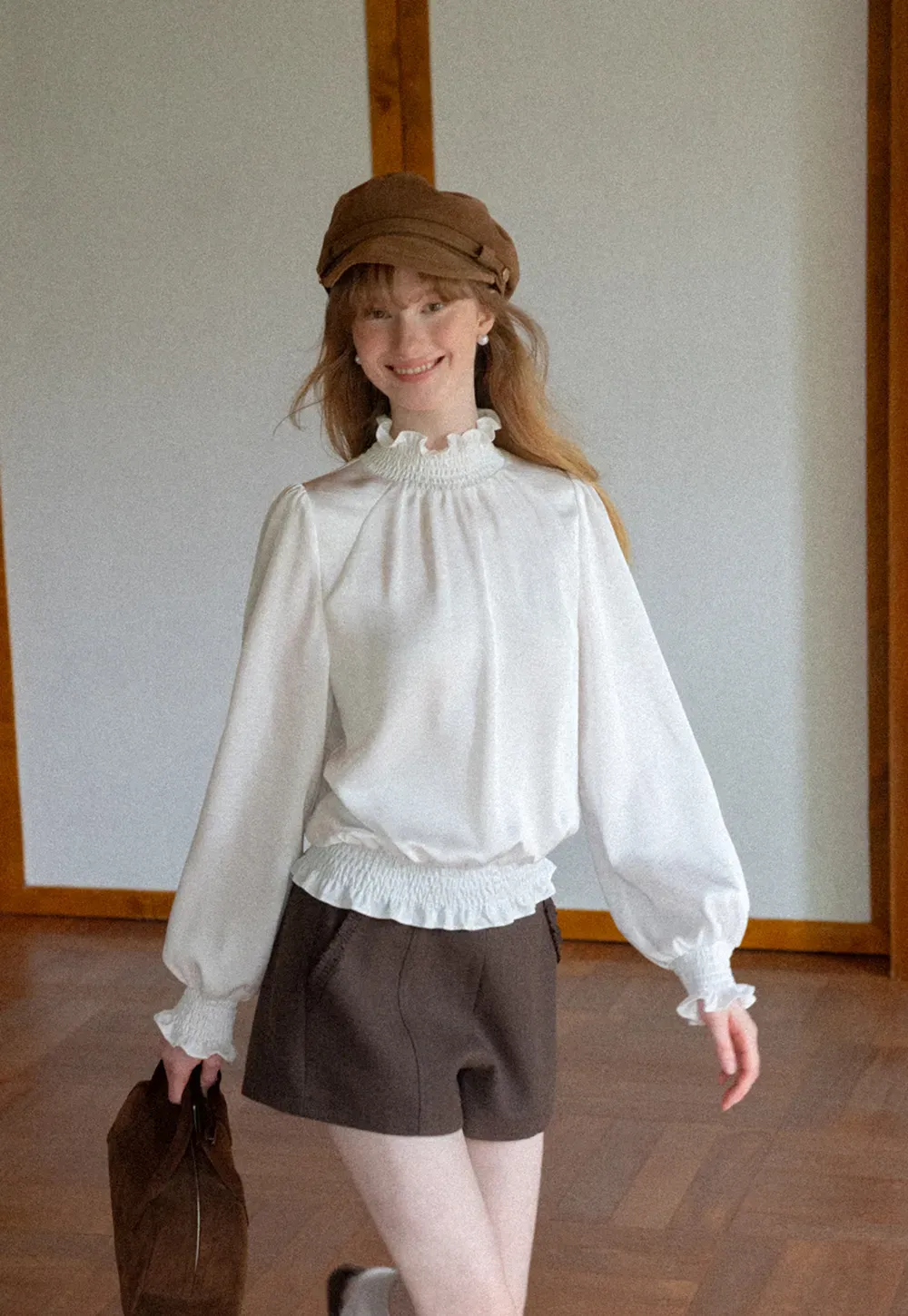 Smocked High Neck Ruffled Cuff Blouse