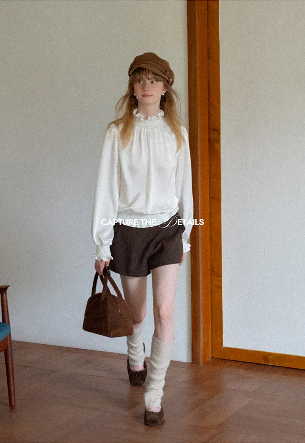 Smocked High Neck Ruffled Cuff Blouse