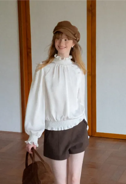 Smocked High Neck Ruffled Cuff Blouse