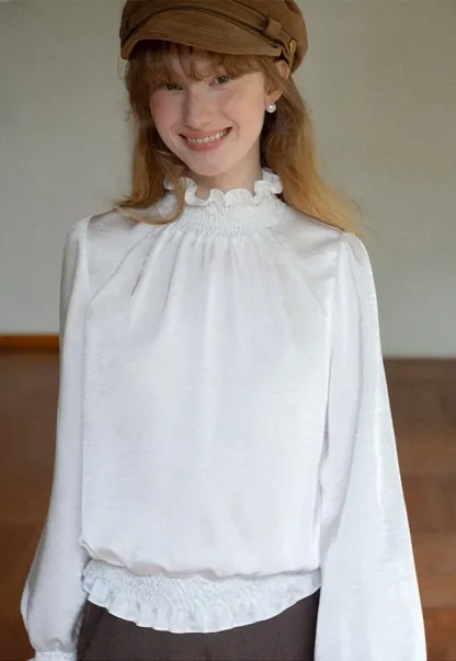 Smocked High Neck Ruffled Cuff Blouse