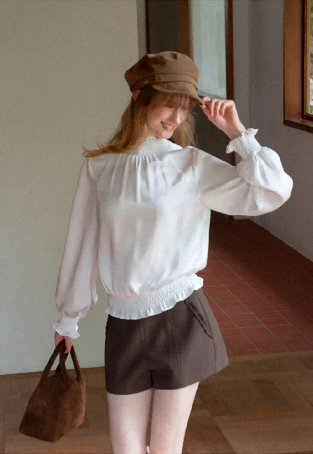 Smocked High Neck Ruffled Cuff Blouse