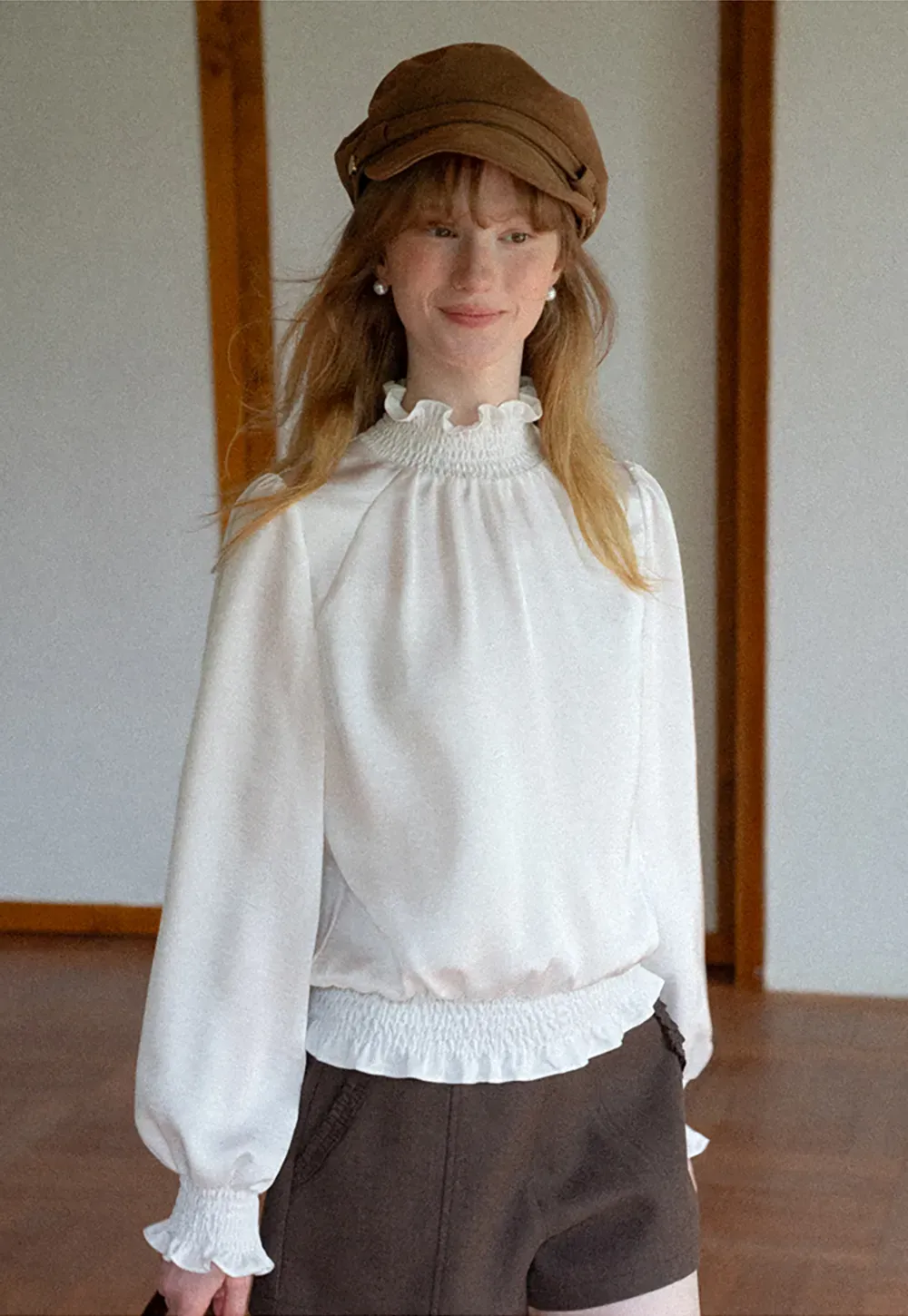 Smocked High Neck Ruffled Cuff Blouse