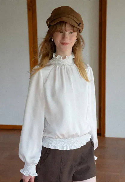Smocked High Neck Ruffled Cuff Blouse