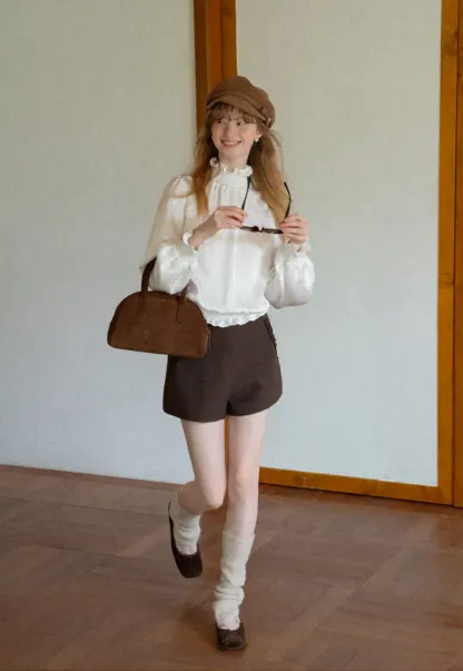 Smocked High Neck Ruffled Cuff Blouse