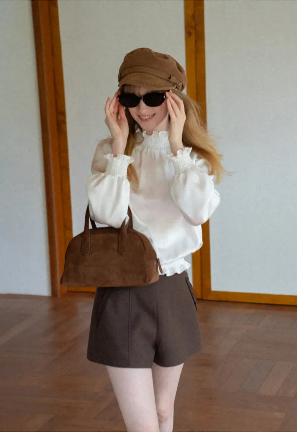 Smocked High Neck Ruffled Cuff Blouse