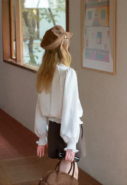 Smocked High Neck Ruffled Cuff Blouse