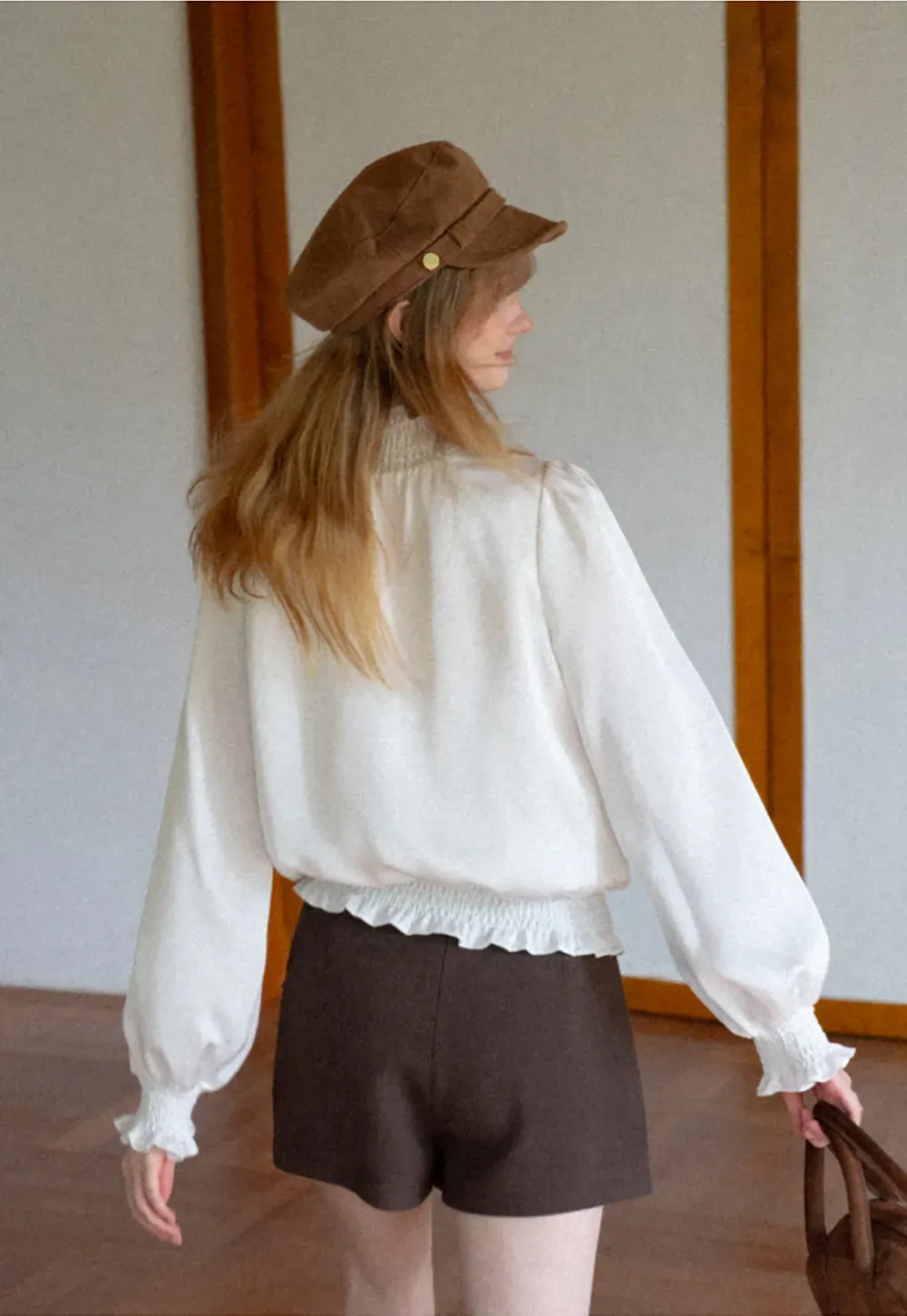 Smocked High Neck Ruffled Cuff Blouse