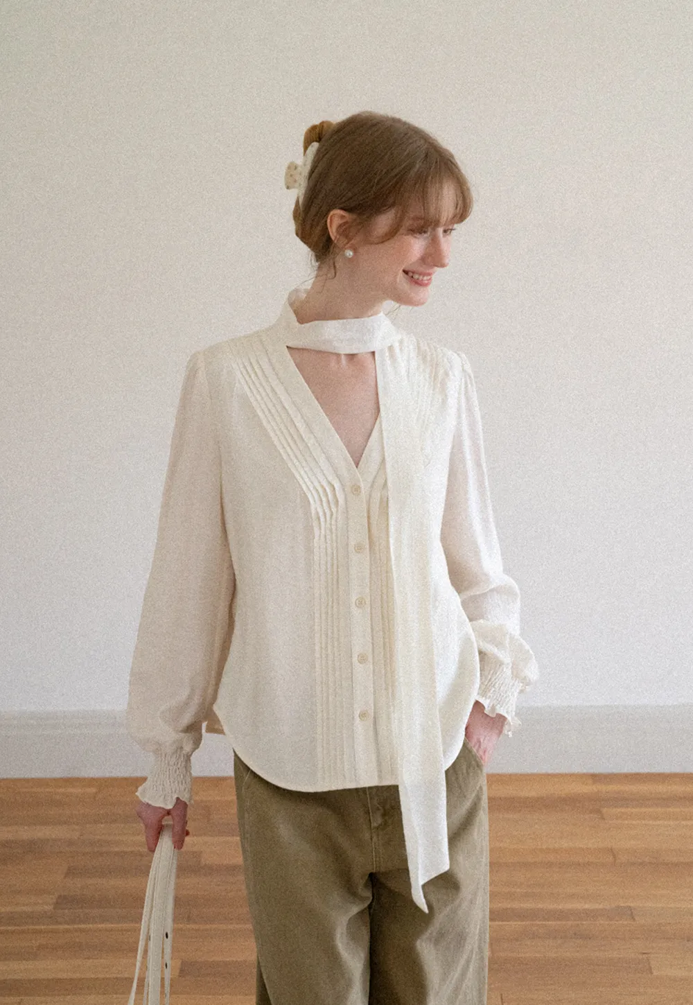 Pleated V Neck Button Up Shirt with Ruffled Cuff