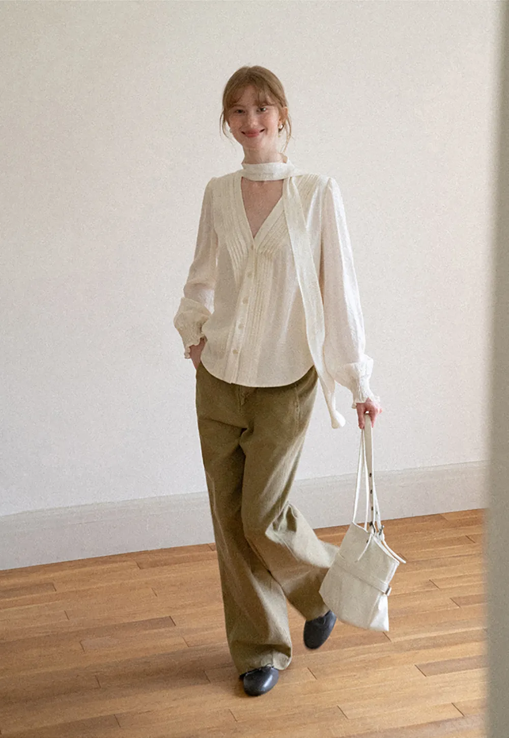 Pleated V Neck Button Up Shirt with Ruffled Cuff