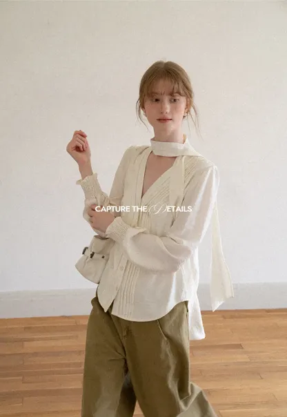 Pleated V Neck Button Up Shirt with Ruffled Cuff
