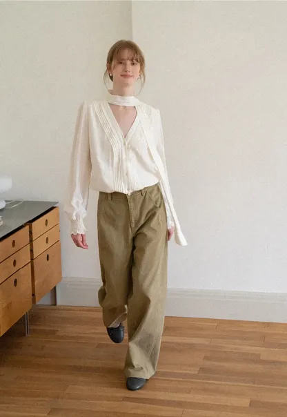 Pleated V Neck Button Up Shirt with Ruffled Cuff