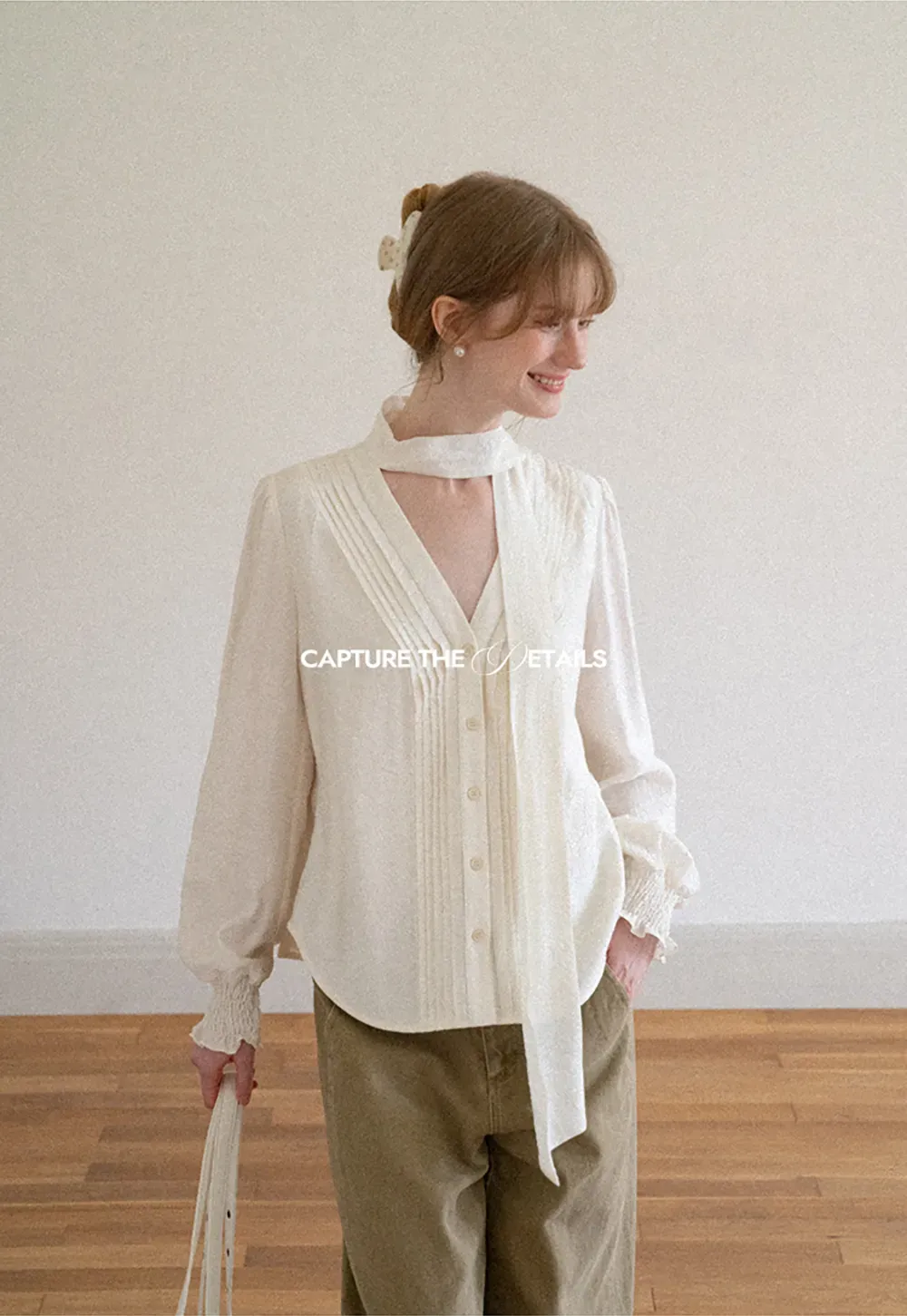 Pleated V Neck Button Up Shirt with Ruffled Cuff
