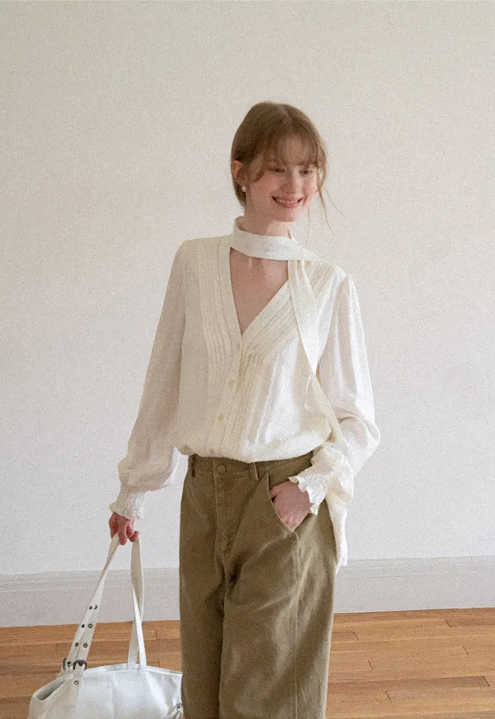Pleated V Neck Button Up Shirt with Ruffled Cuff