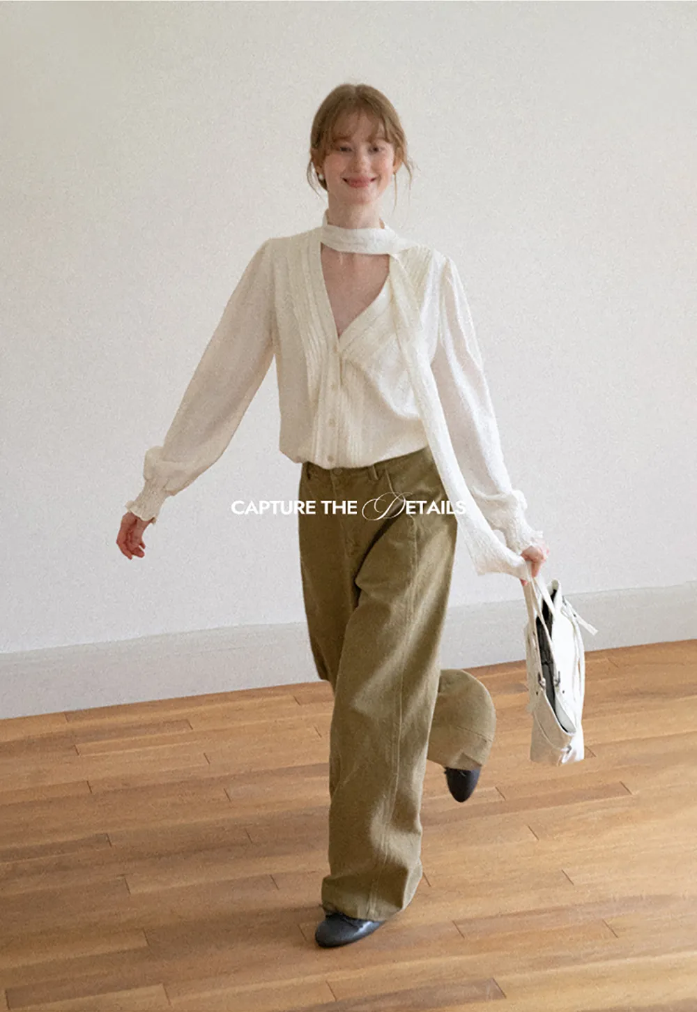Pleated V Neck Button Up Shirt with Ruffled Cuff