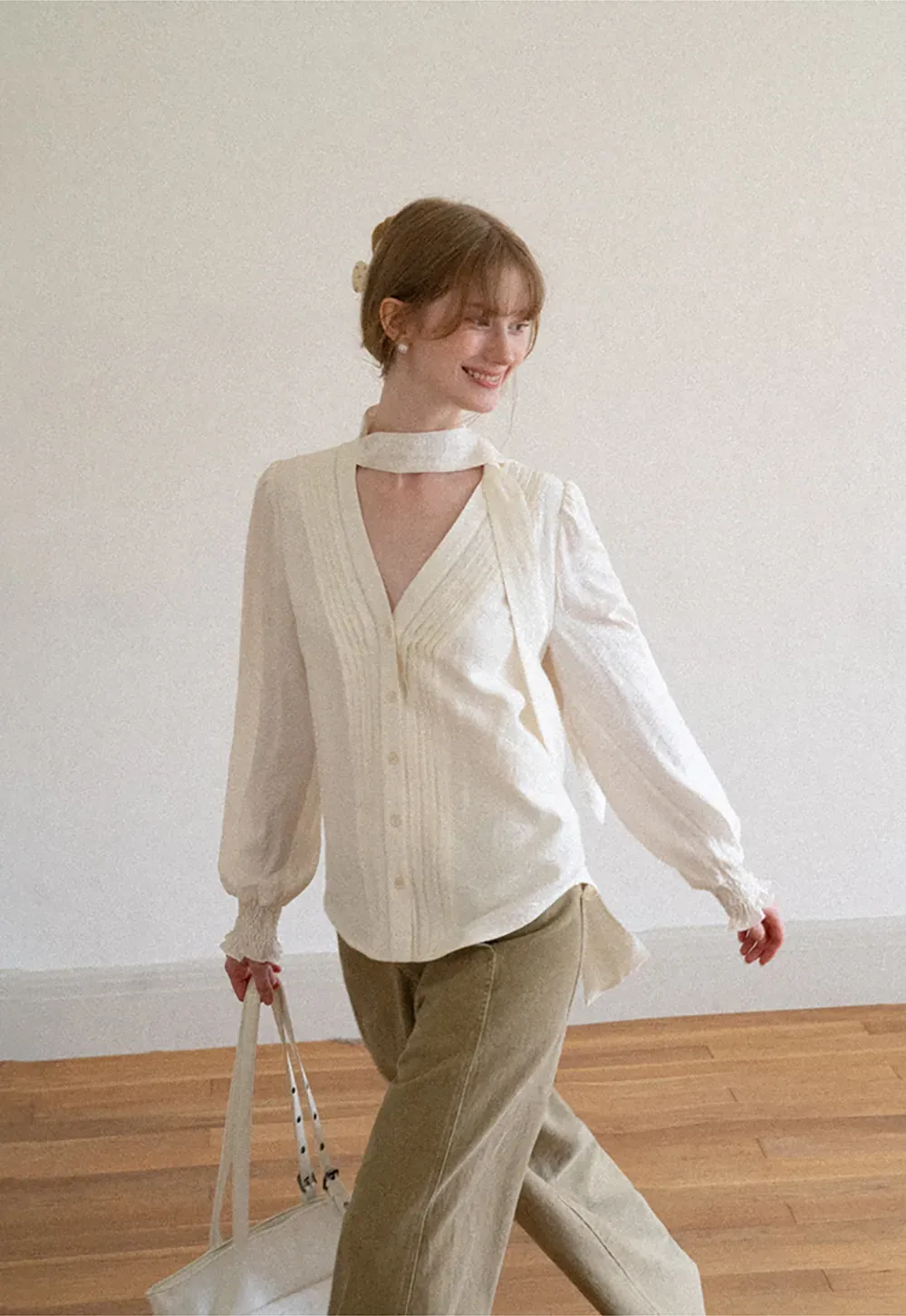 Pleated V Neck Button Up Shirt with Ruffled Cuff