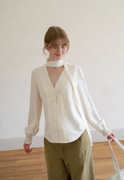 Pleated V Neck Button Up Shirt with Ruffled Cuff