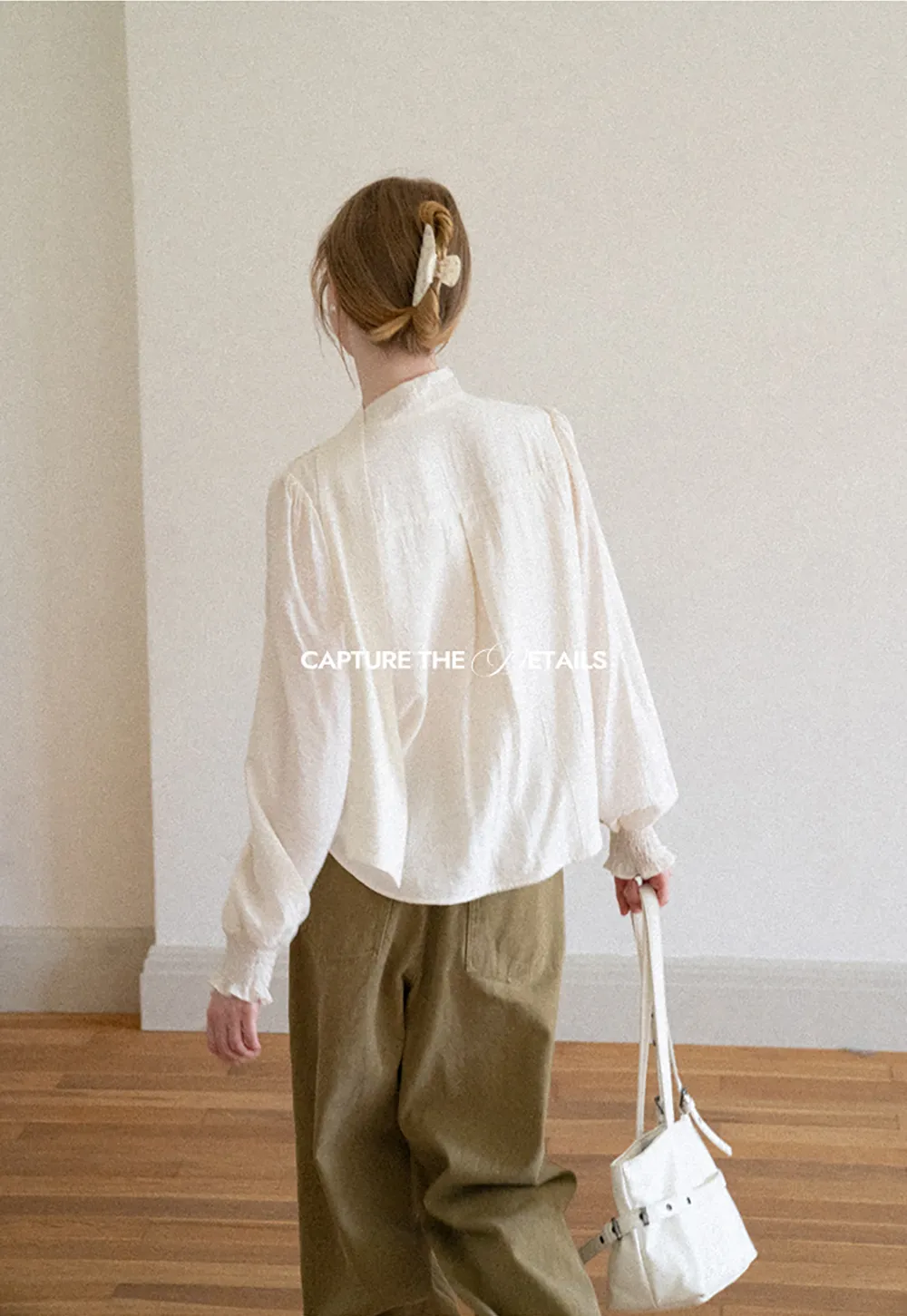 Pleated V Neck Button Up Shirt with Ruffled Cuff