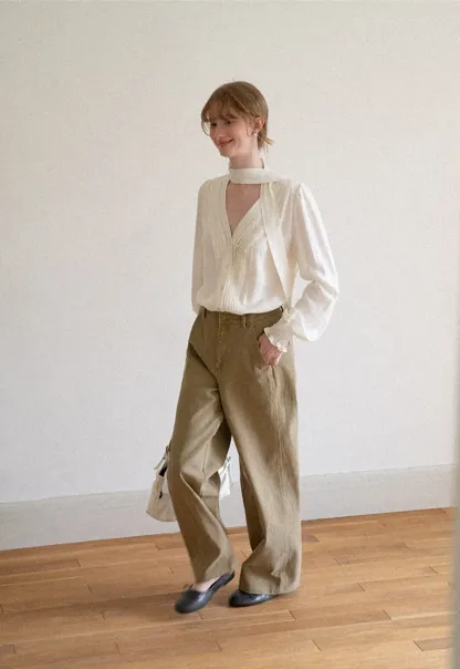 Pleated V Neck Button Up Shirt with Ruffled Cuff