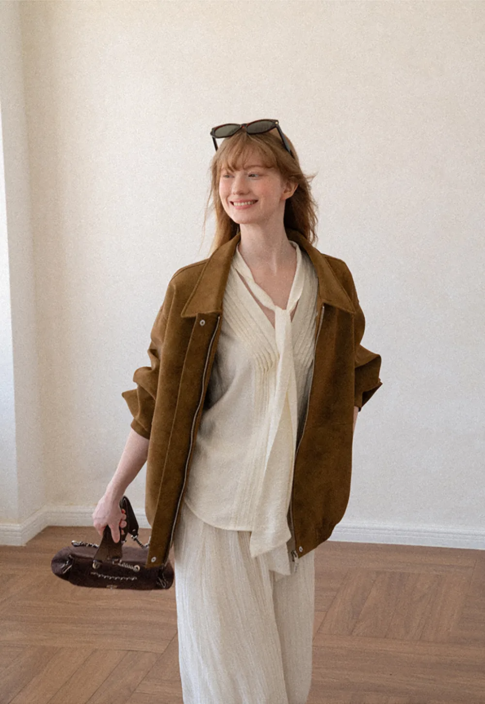 Pleated V Neck Button Up Shirt with Ruffled Cuff