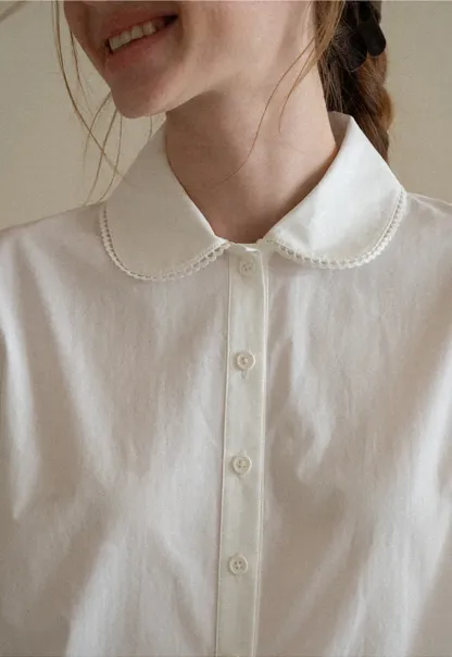 Peter Pan Collar Ruffled Hem Shirt