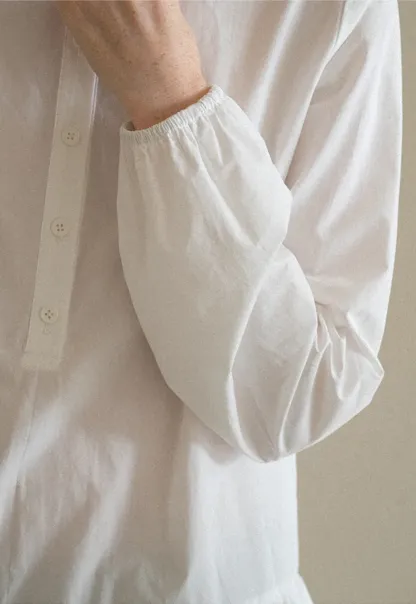 Peter Pan Collar Ruffled Hem Shirt