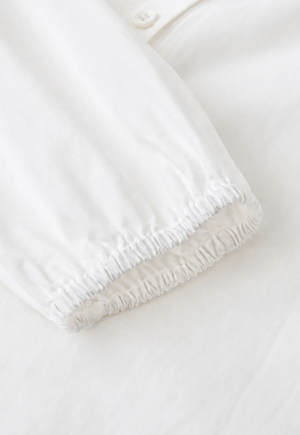 Peter Pan Collar Ruffled Hem Shirt