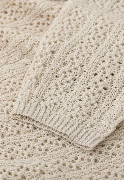 V Neck Loose Knit Sweater with Cable Pattern