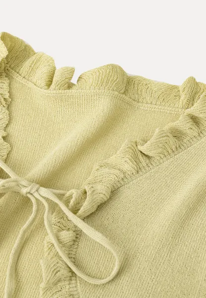 Woolen knit sweater with ruffles and tank top