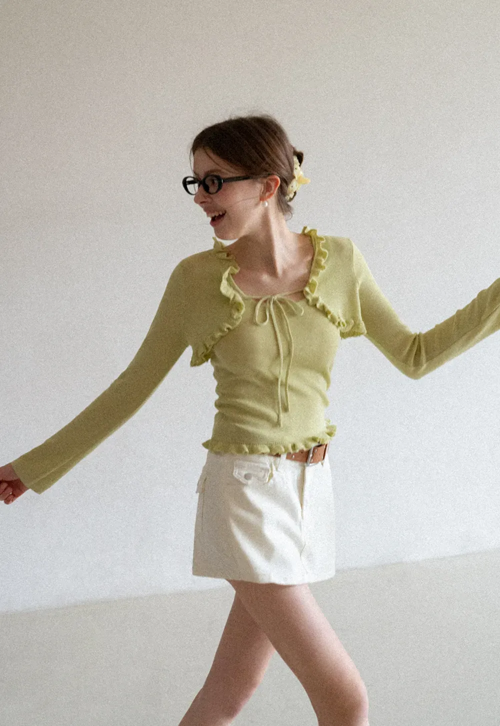 Woolen knit sweater with ruffles and tank top