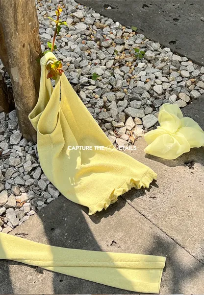 Woolen knit sweater with ruffles and tank top