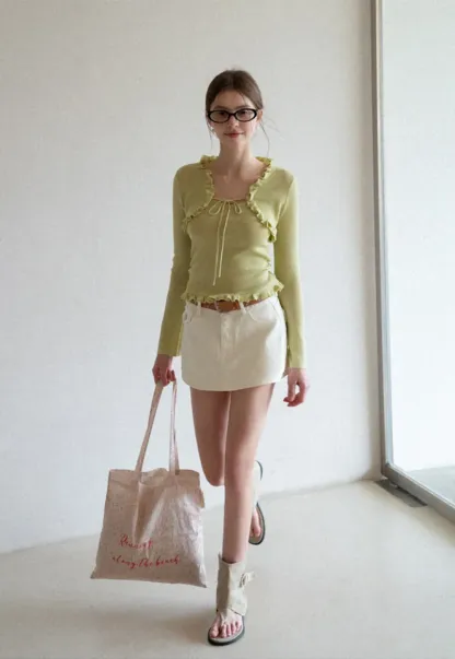 Woolen knit sweater with ruffles and tank top