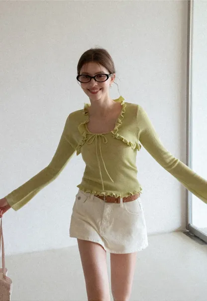 Woolen knit sweater with ruffles and tank top