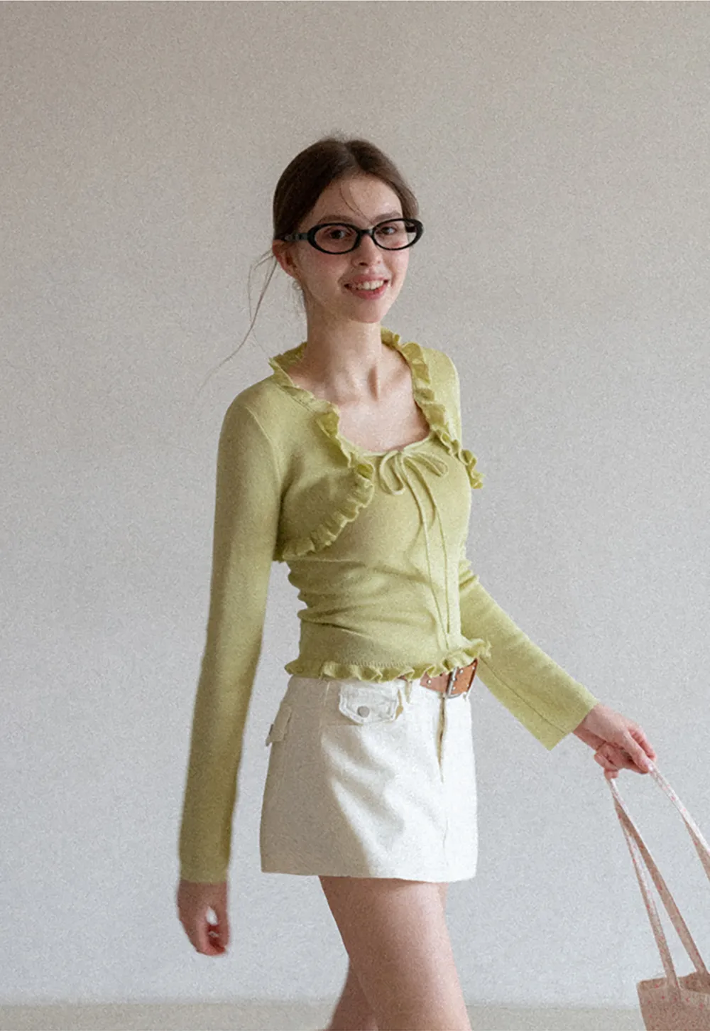 Woolen knit sweater with ruffles and tank top