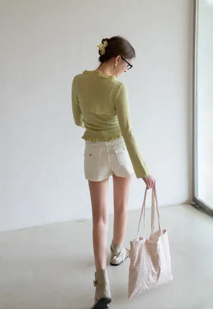 Woolen knit sweater with ruffles and tank top