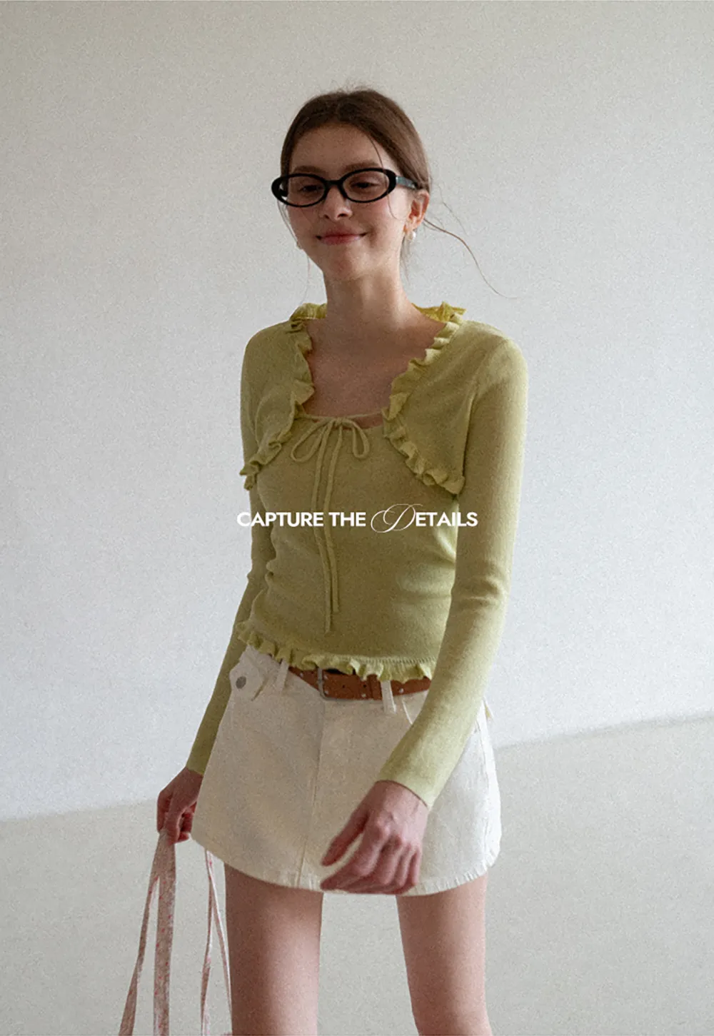 Woolen knit sweater with ruffles and tank top