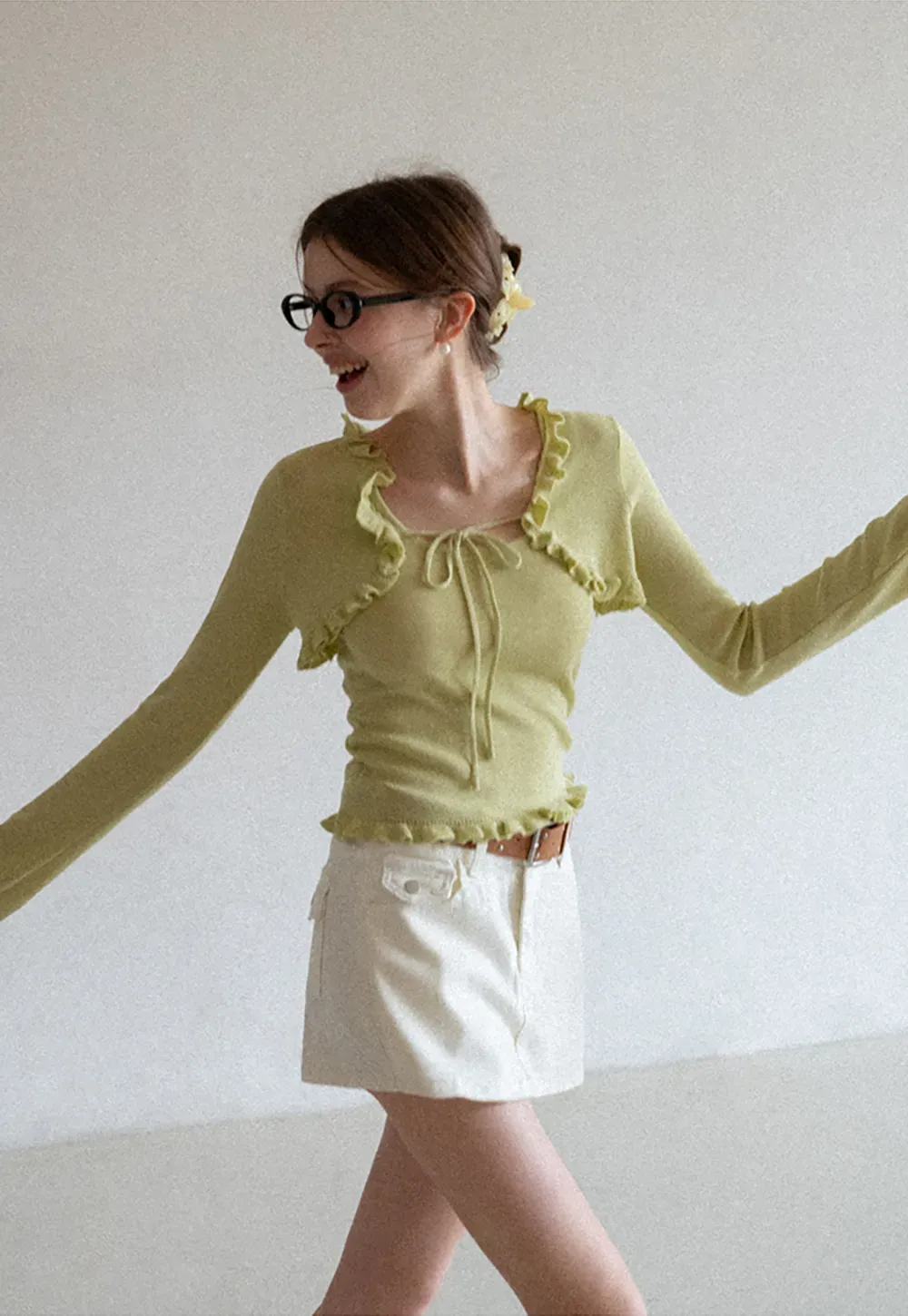 Woolen knit sweater with ruffles and tank top