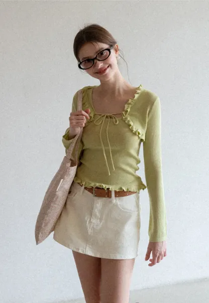 Woolen knit sweater with ruffles and tank top