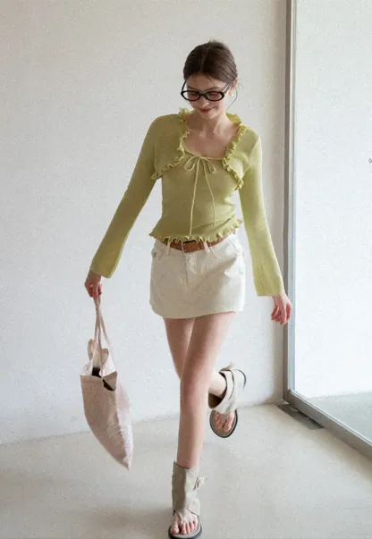 Woolen knit sweater with ruffles and tank top