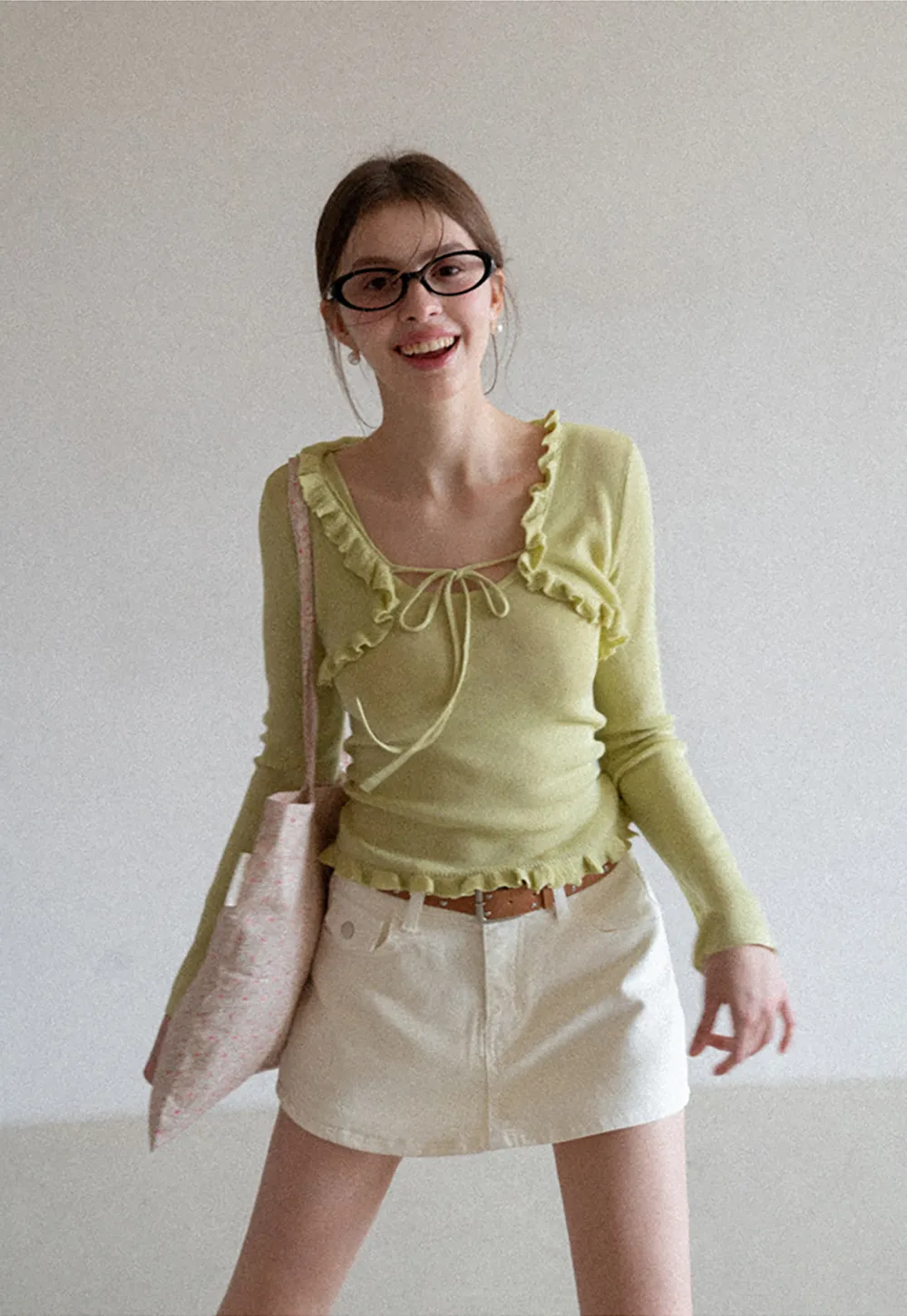 Woolen knit sweater with ruffles and tank top