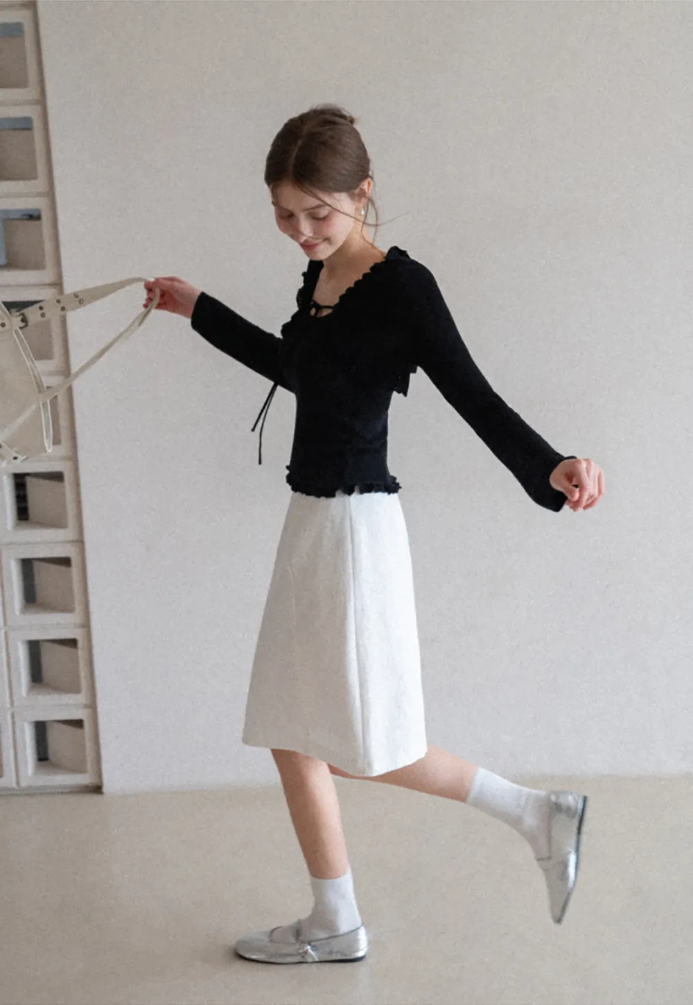 Woolen knit sweater with ruffles and tank top