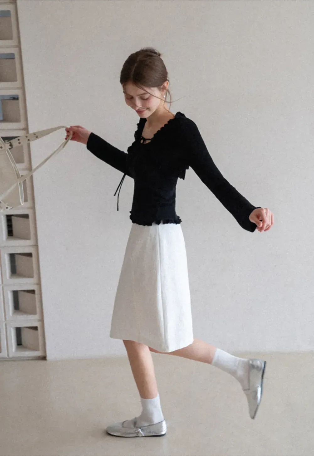 Woolen knit sweater with ruffles and tank top