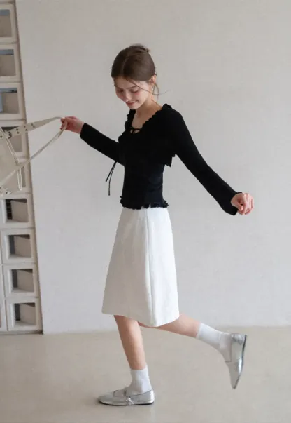 Woolen knit sweater with ruffles and tank top