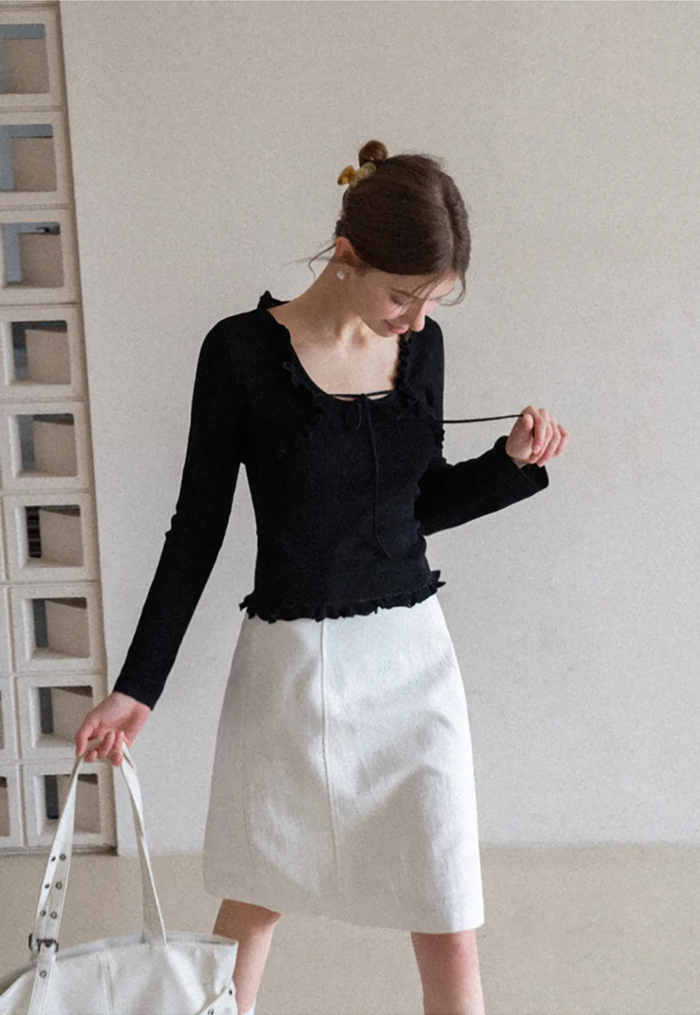 Woolen knit sweater with ruffles and tank top